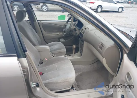 2002 Toyota Corolla Le from USA, damaged, VIN 2T1BR12E82C523143